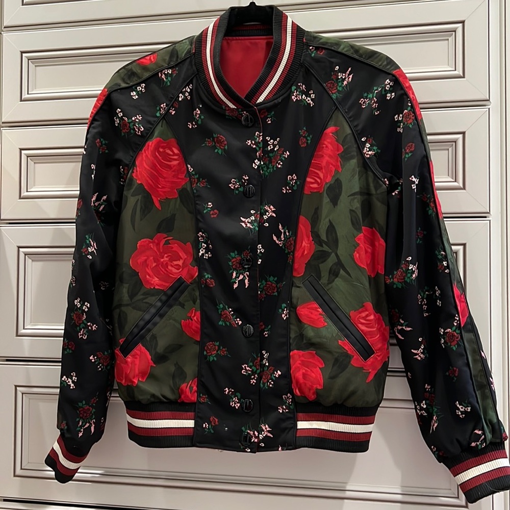 Reversible coat used twice. Red and black one side and floral on the other side